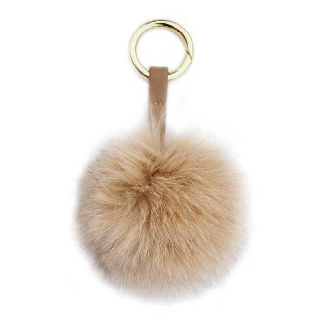 Beige fluffig päls boll