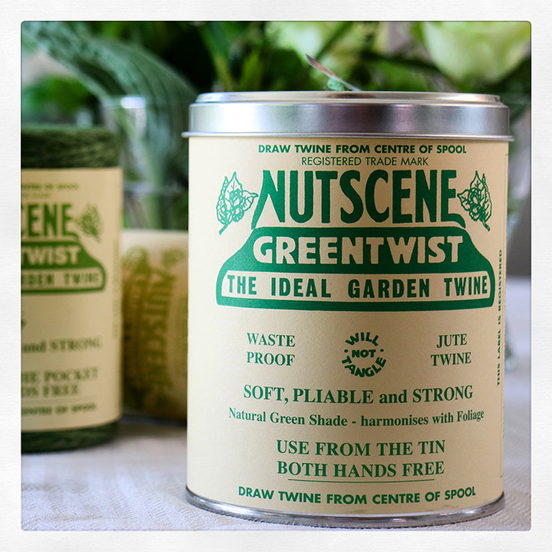 Grönt snöre i plåtburk