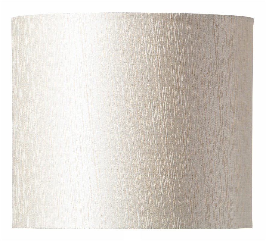 En elegant lampskärm med en krämigt benvit utsida och guldig insida