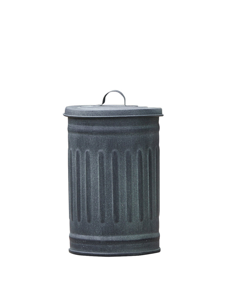 Liten grön soptunna med lock